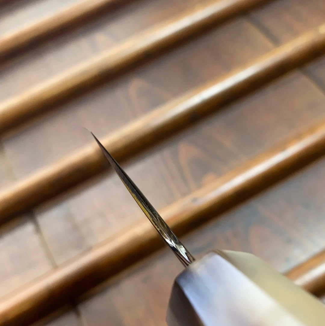 Hitohira Togashi 180mm Santoku Kasumi Stainless Clad Shirogami 1 Ebony Blonde Handle 8 Hitohira Togashi 180mm Santoku Kasumi Stainless Clad Shirogami 1 Ebony Blonde Handle - Image 6